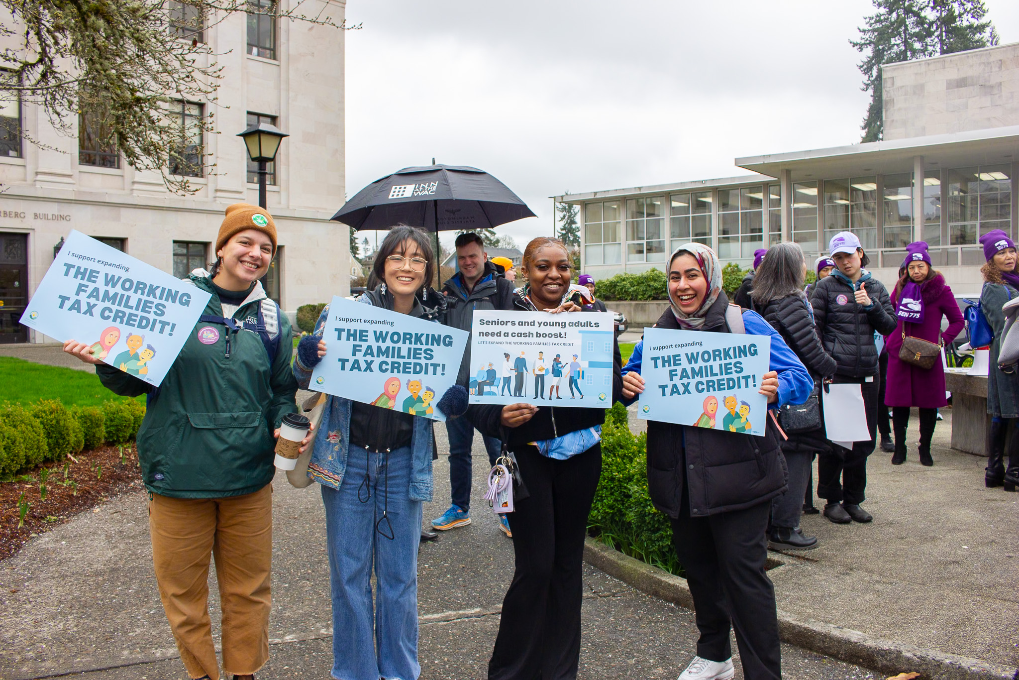 Fuse Communications Manager Abigail Leong with partners from Poverty Action Network and YWCA at the Balance Our Tax Code rally