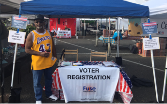 A Fuse volunteer registering voters in Federal Way