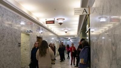 Advocates mingle in the hallways of the Washington state legislative building